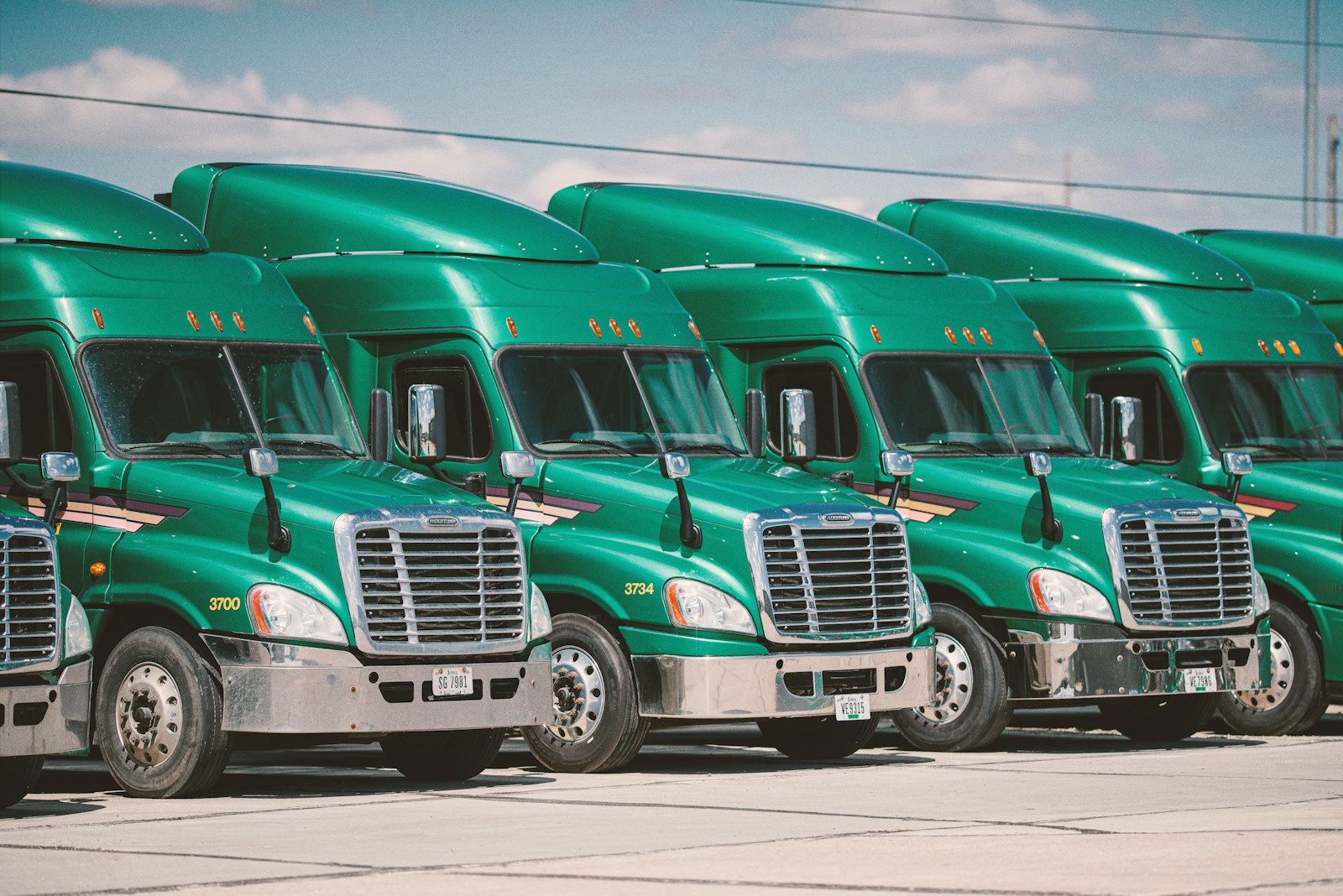 green and white vintage truck with commercial auto insurance
