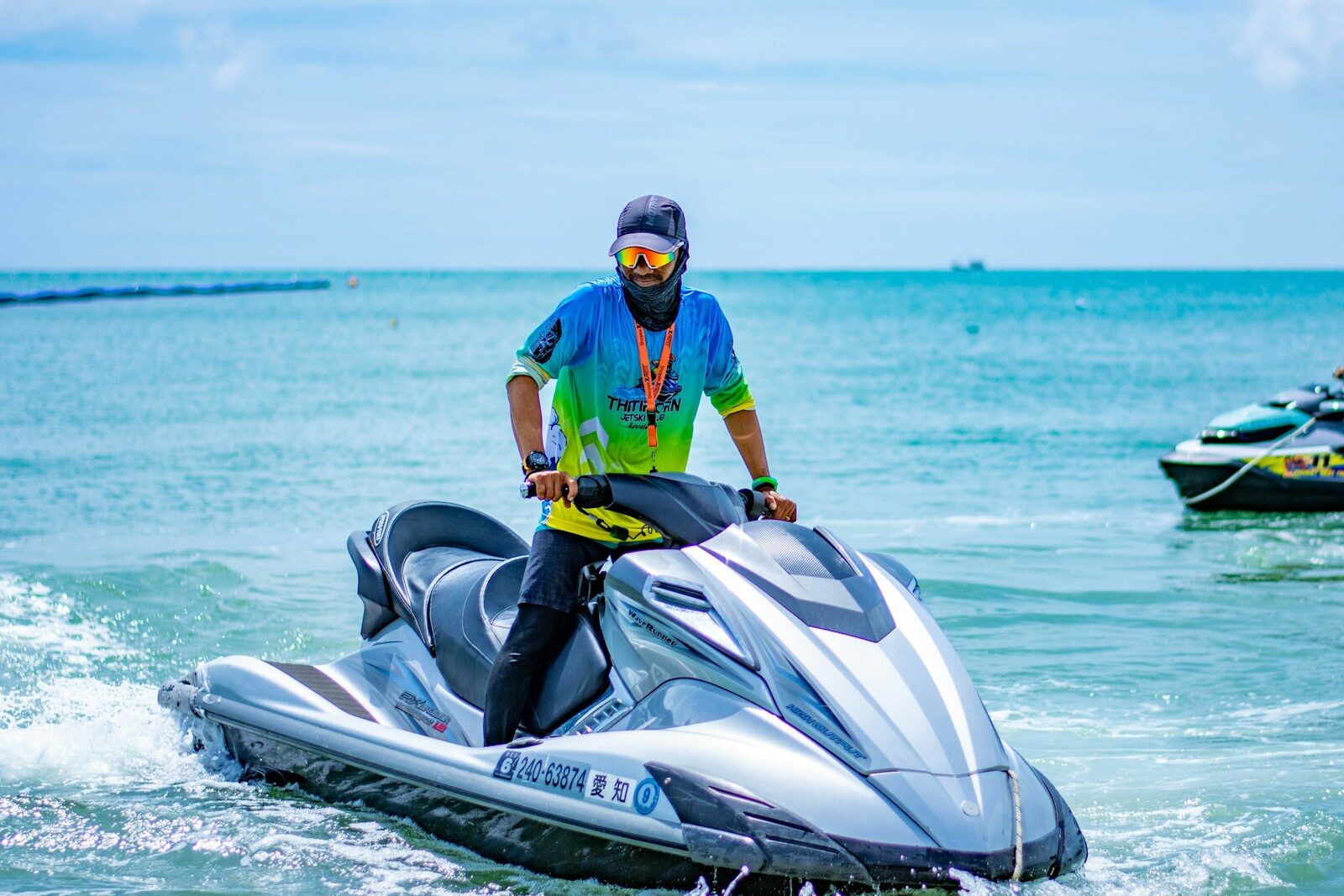 Man riding a jet ski on the ocean
